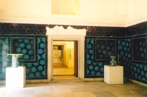 A turquoise and black geometric ornamentation