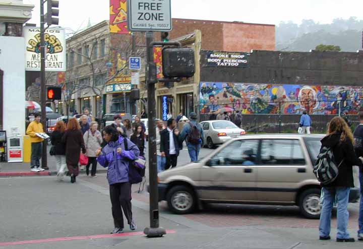 Telegraph Ave, Berkeley; cars and people both use the space