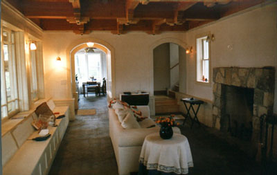 Living room with exposed beams and smaller beams