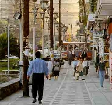 Wide pedestrian streets crossing densely traveled roads