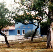 View of house through Commons Land